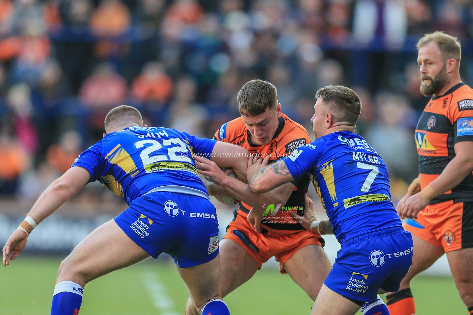 16th May 2019 , Emerald  Carnegie Stadium, England; Betfred Super League, Round 15, Leeds Rhinos vs Castleford Tigers ; Jake Trueman (6) of Castleford Tigers is tackled by Cameron Smith (22) of Leeds Rhinos and Richie Myler (7) of Leeds Rhinos 


Credit: Mark Cosgrove/News Image