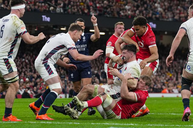 Ben Curry of England is tackled by Jac Morgan of Wales during the 2025 Guinness 6 Nations match Wales vs England at Principality Stadium, Cardiff, United Kingdom, 15th March 2025

(Photo by Andrew Lewis/News Images)
