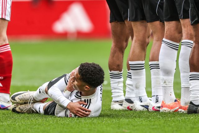 Kenny Tete of Fulham lays behind the wall during the Premier League match Nottingham Forest vs Fulham at City Ground, Nottingham, United Kingdom on 15 March 2026

(Photo by Alfie Cosgrove/News Images)