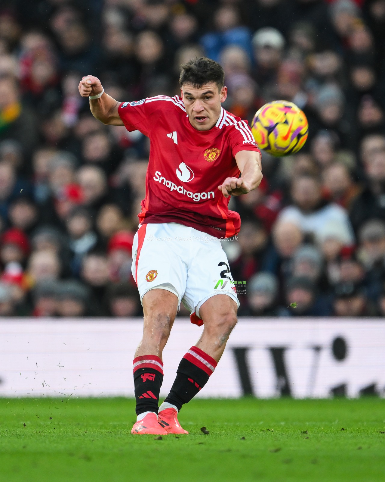 Manuel Ugarte of Manchester United passes the ball during the Premier League match Manchester United vs Bournemouth at Old Trafford, Manchester, United Kingdom, 22nd December 2024

(Photo by Craig Thomas/News Images)