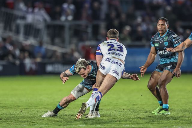 Josh Rourke of Wakefield Trinity is tackled by Ethan O'neill of Leigh Leopards during the Betfred Challenge Cup Quarter Final match Wakefield Trinity vs Leigh Leopards at DIY Kitchens Stadium, Wakefield, United Kingdom, 4th April 2025

(Photo by Alfie Cosgrove/News Images)