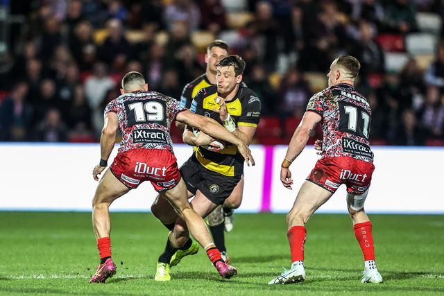 Sam Wood of York Knights is tackled by Innes Senior of Leigh Leopards and Frankie Halton of Leigh Leopards during the Betfred Super League round 8 match York Knights vs Leigh Leopards at LNER Community Stadium, York, United Kingdom on 17 April 2026

(Photo by Alfie Cosgrove/News Images)