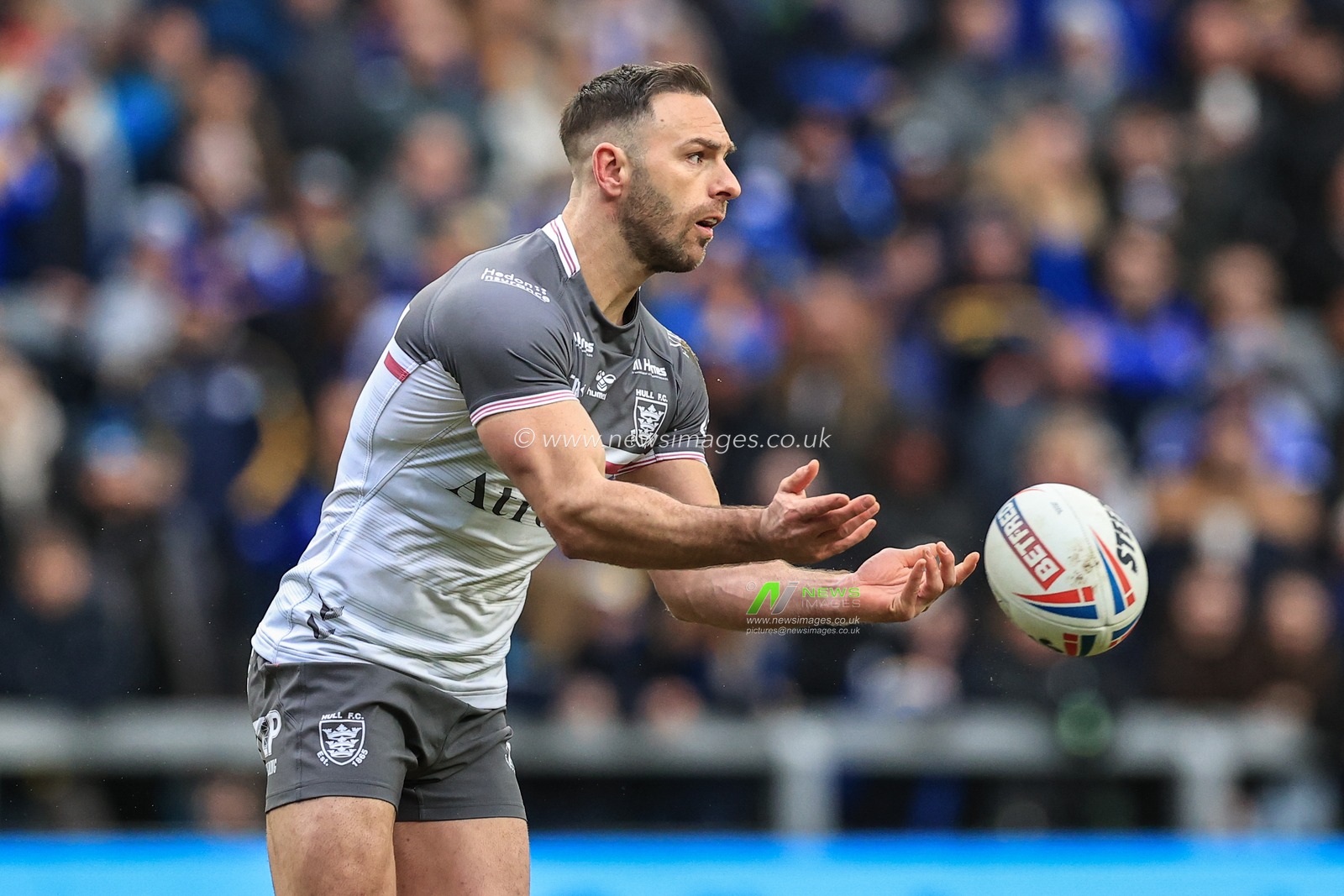 Luke Gale of Hull FC passes the ball