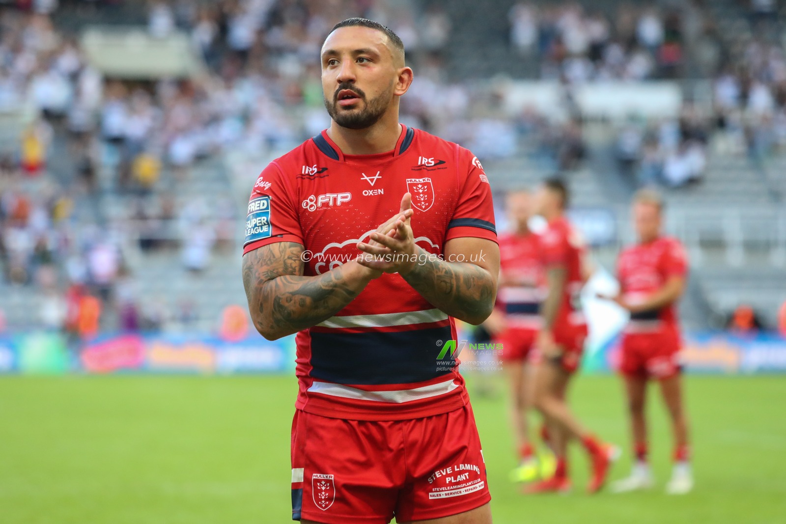Elliot Minchella #17 of Hull KR applauds the travelling Hull KR fans