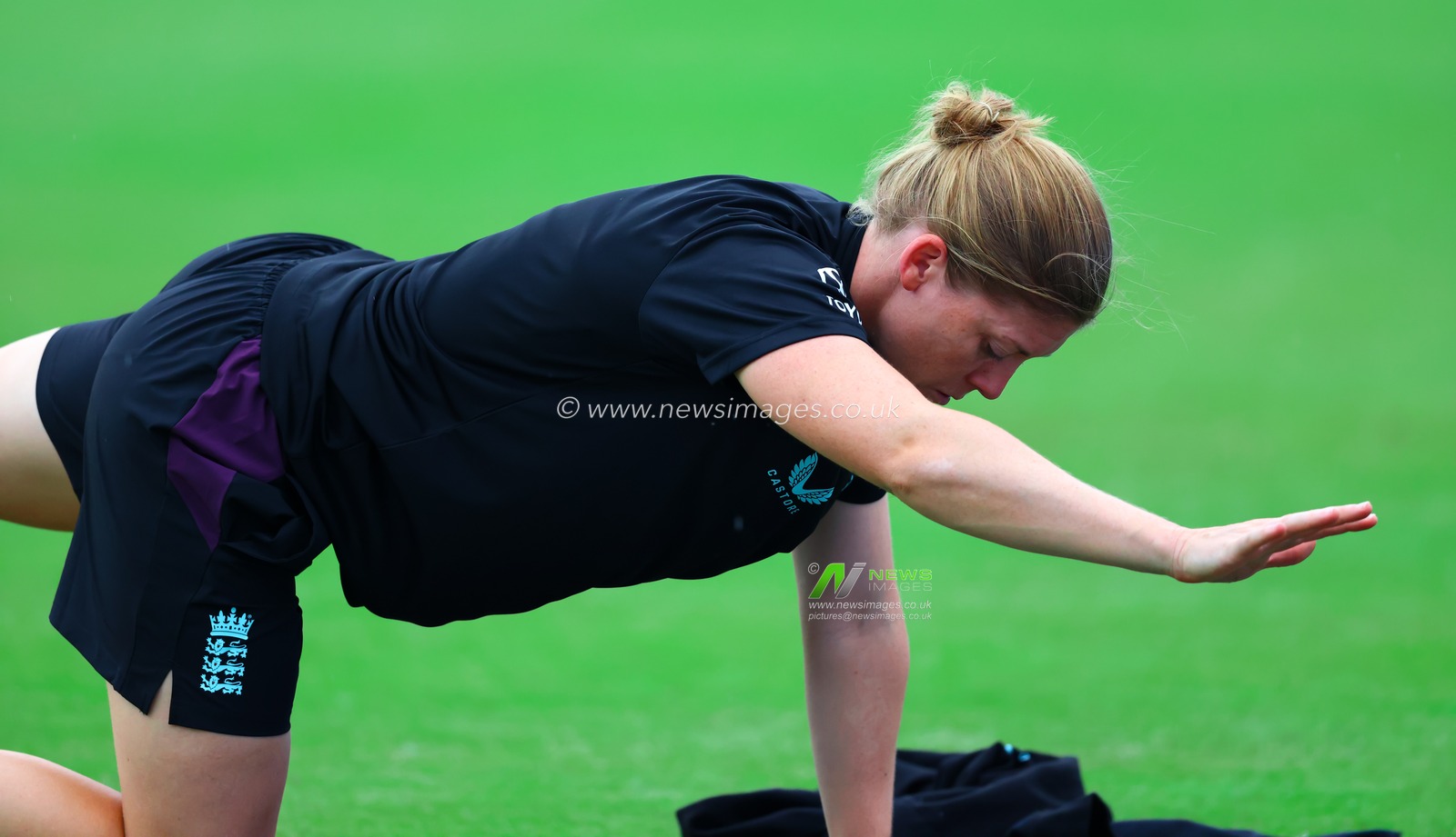 Heather Knight of England doing back mobility and stretching during the ICC Women's World Cup England Woman vs South Africa Women pre match training session at ACA Barsapara Cricket Stadium, Guwahati, India, 2nd October 2025

(Photo by Shubhajit Roy Karmakar/News Images)