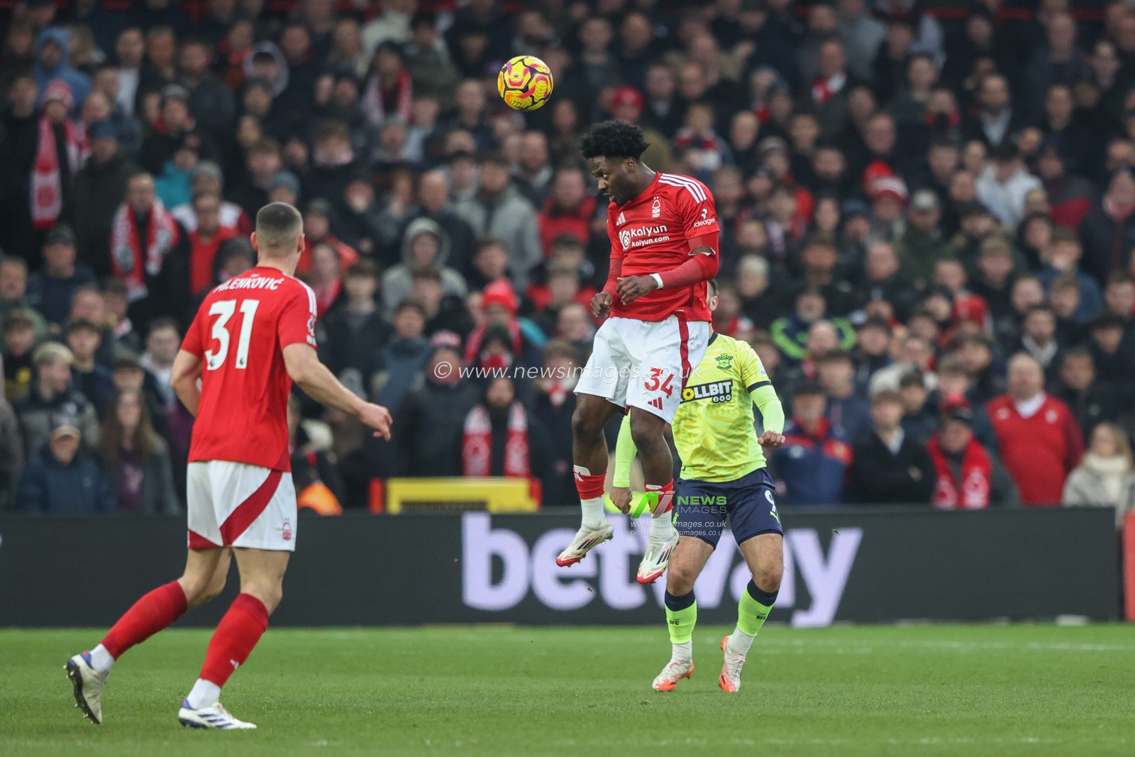 Ola Aina of Nottingham Forest jumps up to win the high ball during the Premier League match Nottingham Forest vs Southampton at City Ground, Nottingham, United Kingdom, 19th January 2025

(Photo by Alfie Cosgrove/News Images)