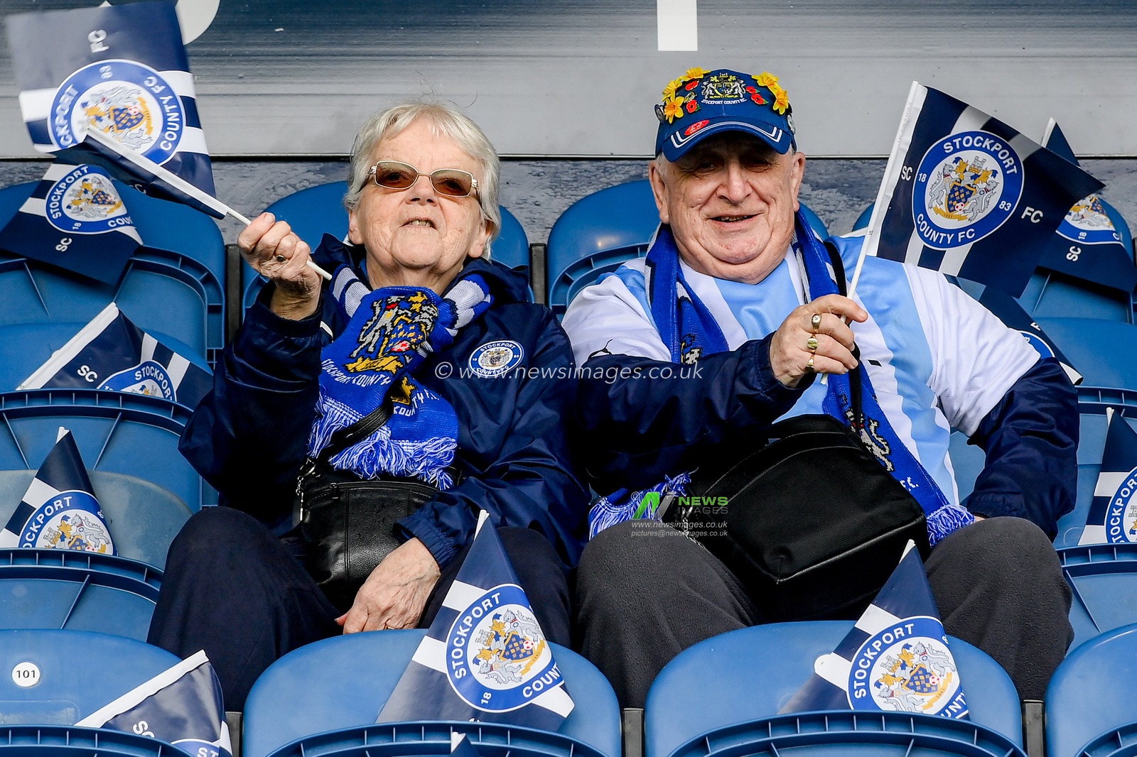 A couple of Stockport fans take their seats early for the the Sky Bet League 2 match Stockport County vs Hartlepool United at Edgeley Park Stadium, Stockport, United Kingdom, 8th May 2023

(Photo by Ben Roberts/News Images)