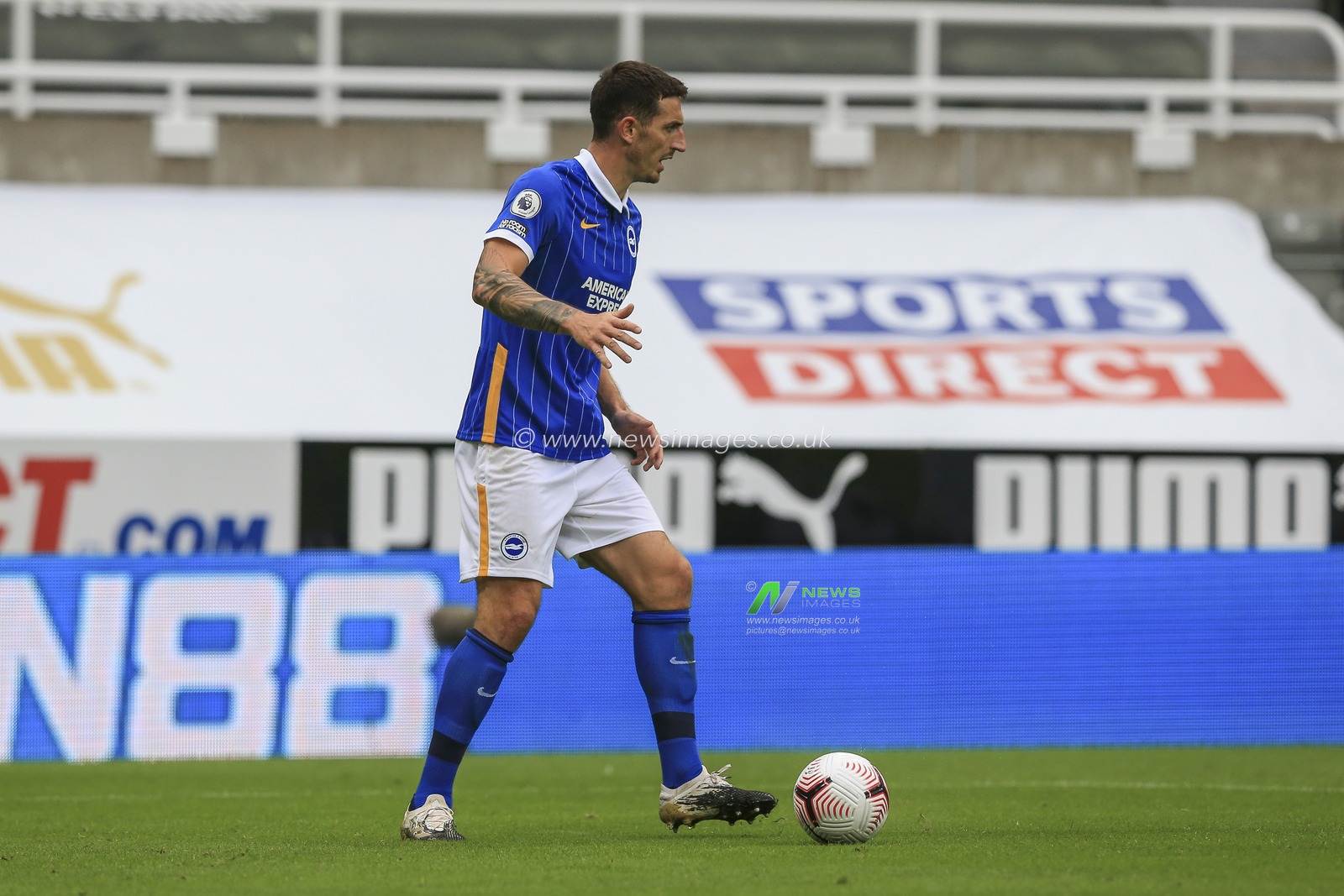 Lewis Dunk (5) of Brighton and Hove Albion in possession of the ball