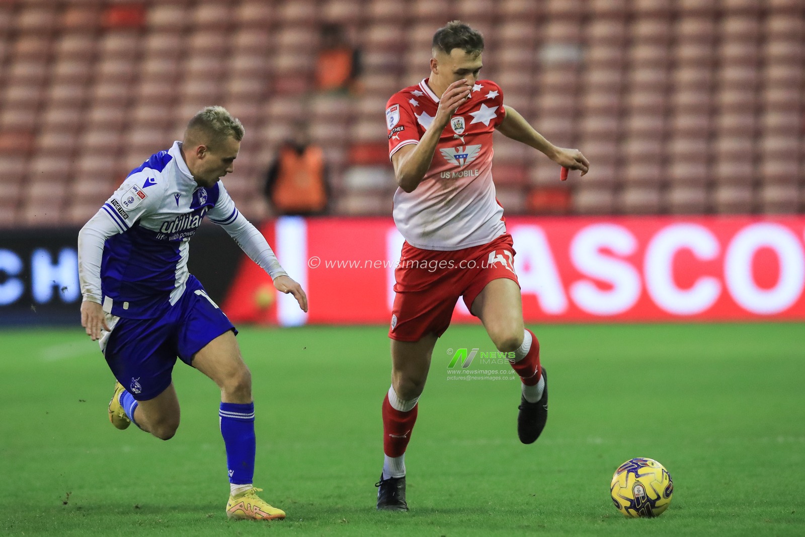 Jack Shepherd of Barnsley breaks with the ball followed closely by Luke Thomas of Bristol Rovers during the Sky Bet League 1 match Barnsley vs Bristol Rovers at Oakwell, Barnsley, United Kingdom, 13th January 2024

(Photo by Alfie Cosgrove/News Images)