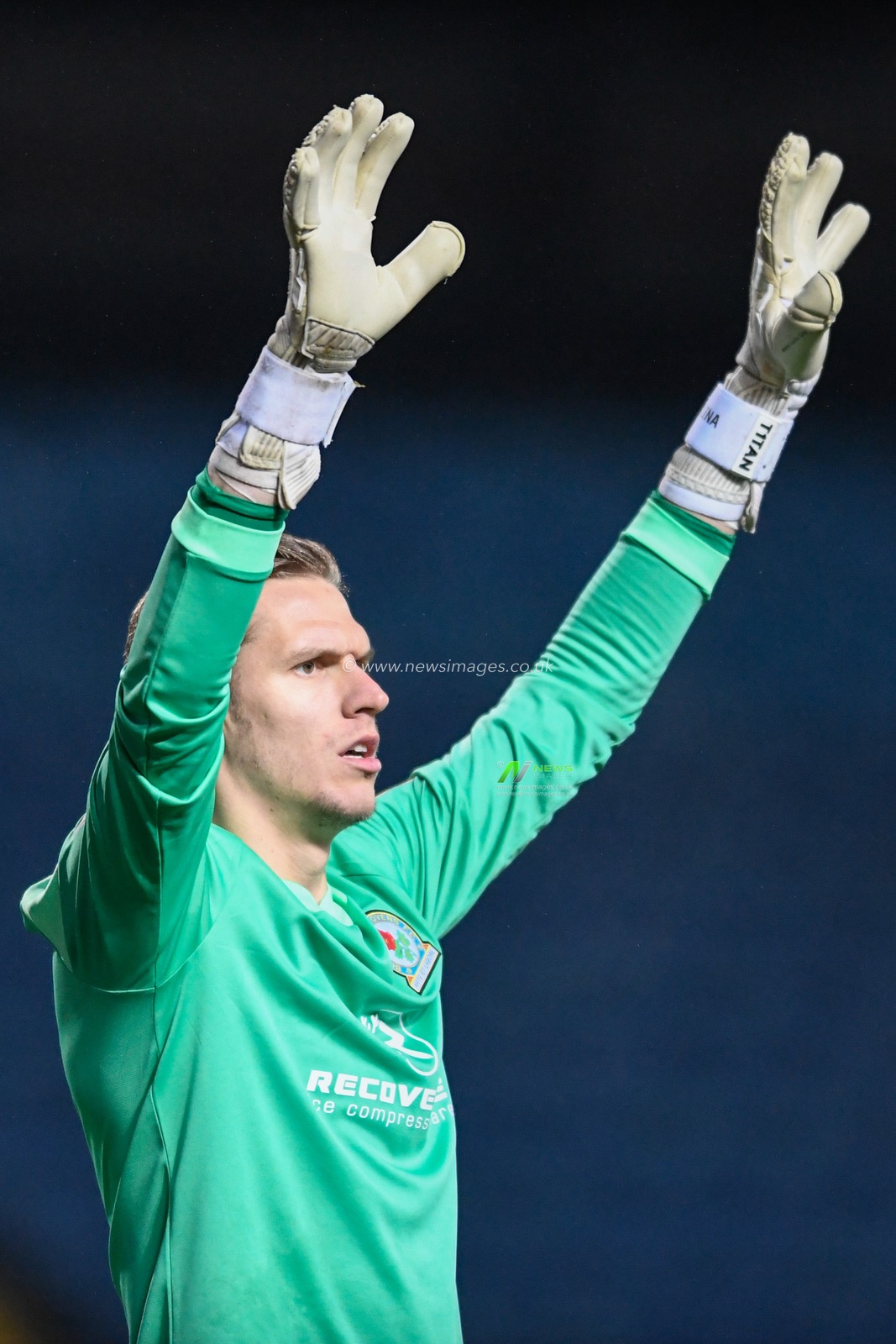 Thomas Kaminski #1 of Blackburn Rovers with his arms in the air