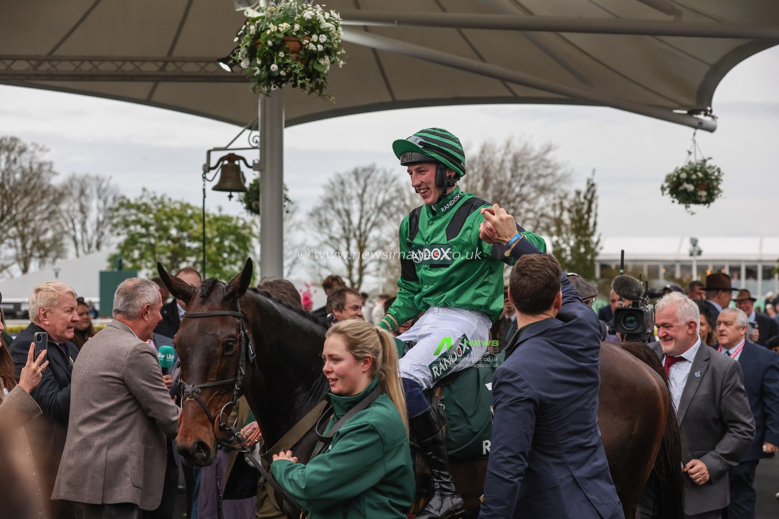 Racegoers enjoy the atmosphere during the The Randox Grand National 2024 Ladies Day at Aintree Racecourse, Liverpool, United Kingdom, 12th April 2024

(Photo by Mark Cosgrove/News Images)