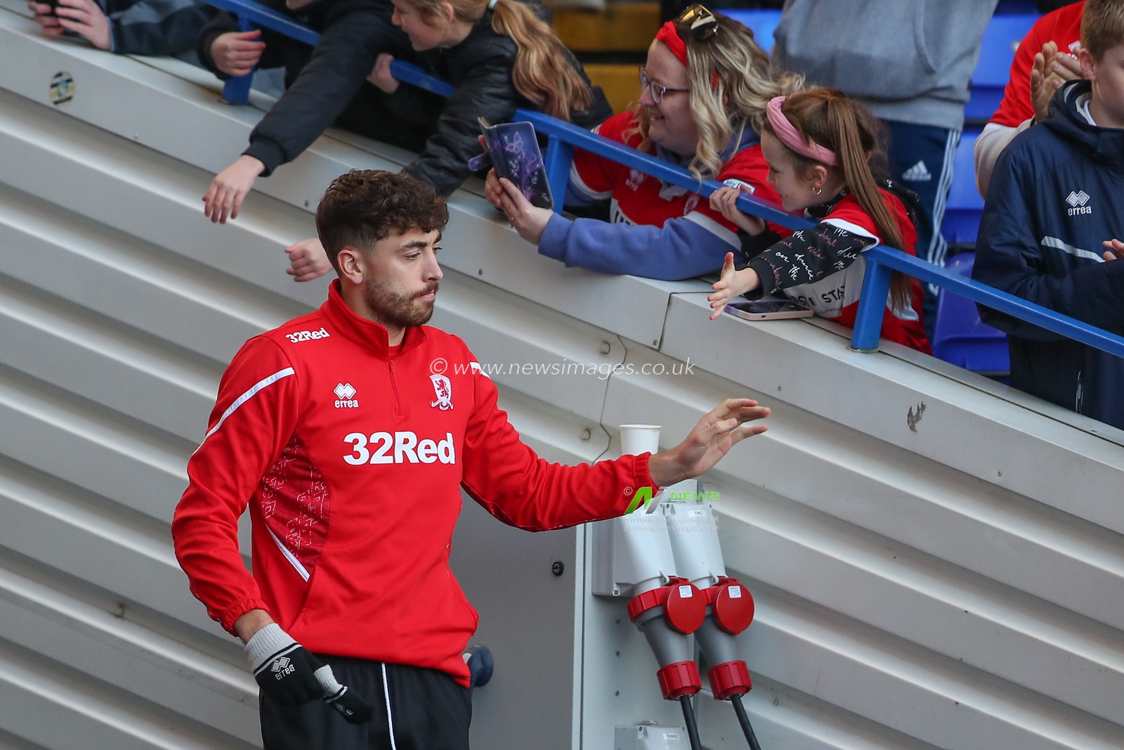 Matt Crooks #25 of Middlesbrough high fives fans during the pre-game warm up ahead of the Sky Bet Championship match Birmingham City vs Middlesbrough at St Andrews, Birmingham, United Kingdom, 2nd January 2023

(Photo by Gareth Evans/News Images)