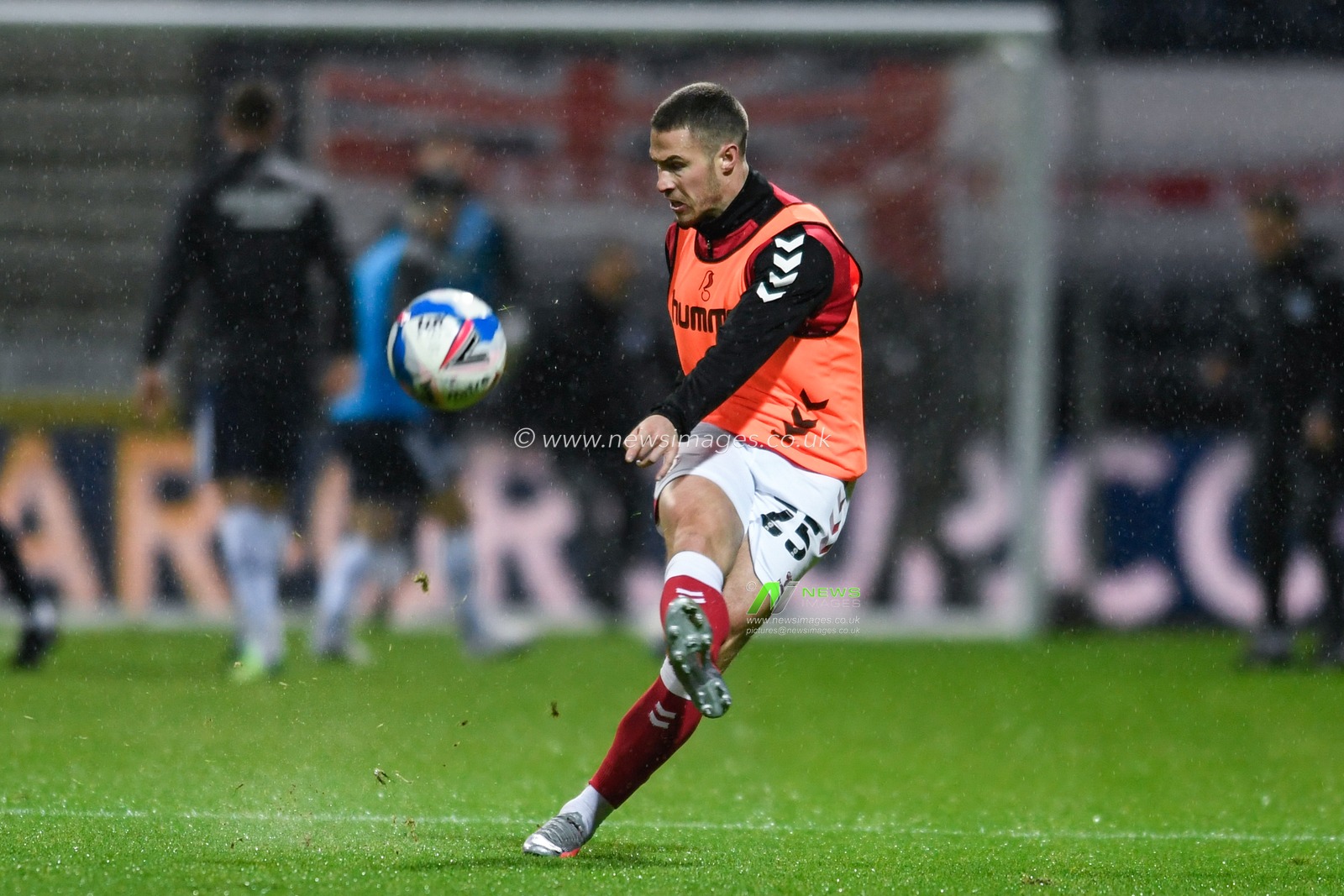 Tommy Rowe #25 of Bristol City warming up before the game