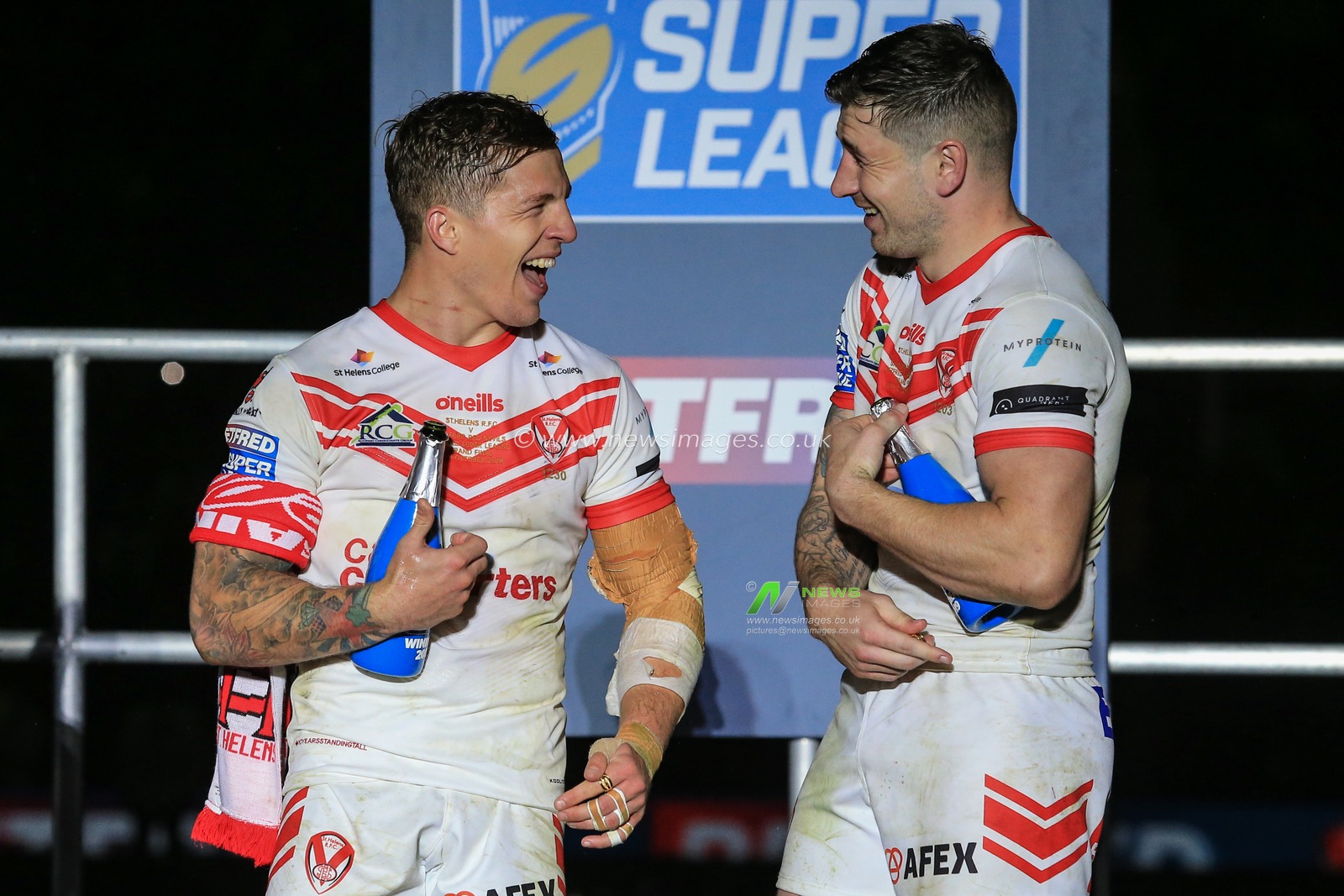 12th October 2019, Old Trafford, Manchester, England; The Grand Final 2019, Saint Helens v Salford Red Devils :Theo Fages (6) and Mark Percival (4) of St Helens enjoy a joke together

Credit: David Greaves/News Images