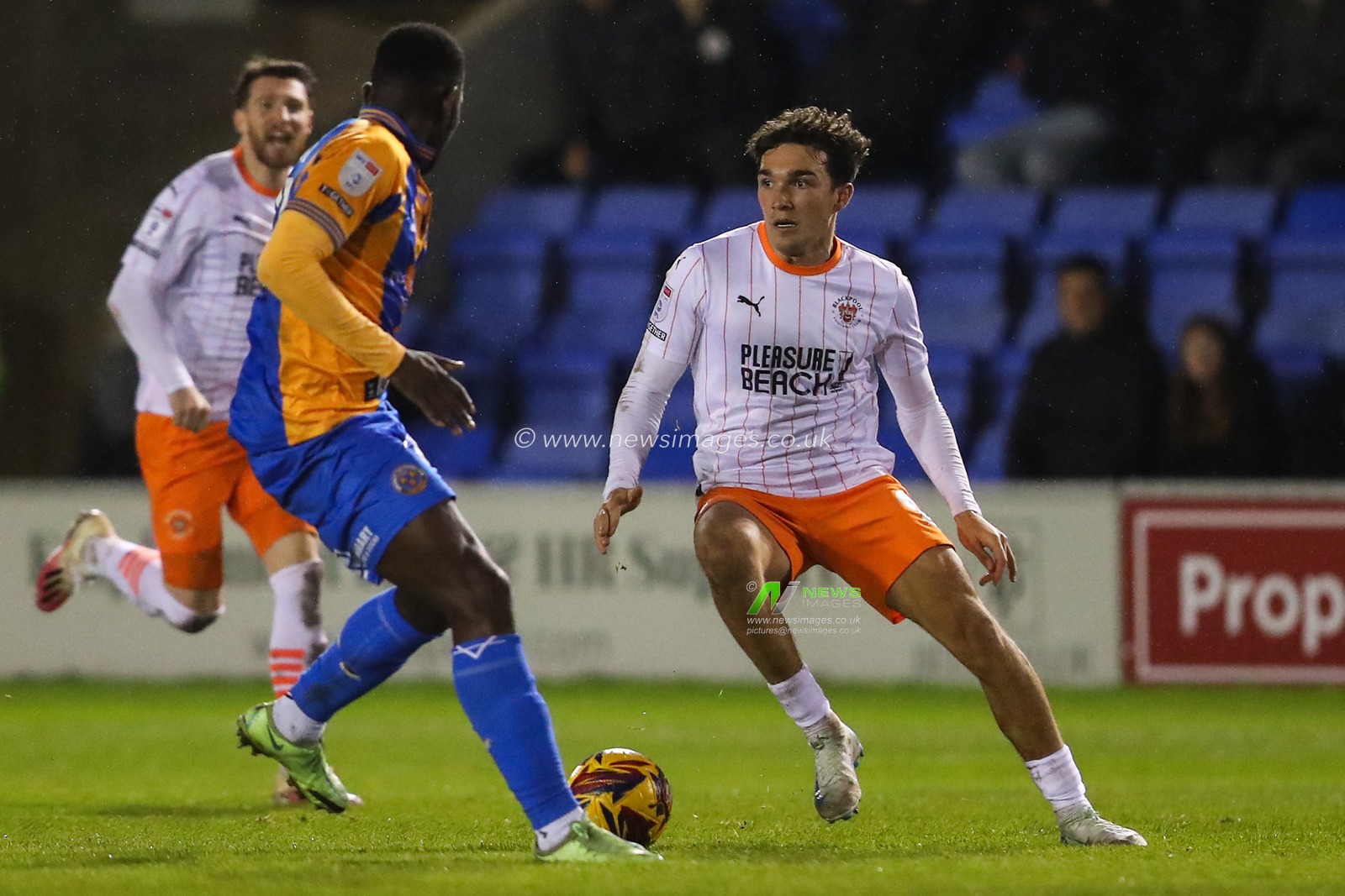 Kyle Joseph of Blackpool goes forward with the ball during the Sky Bet League 1 match Shrewsbury Town vs Blackpool at Croud Meadow, Shrewsbury, United Kingdom, 4th December 2024

(Photo by Gareth Evans/News Images)