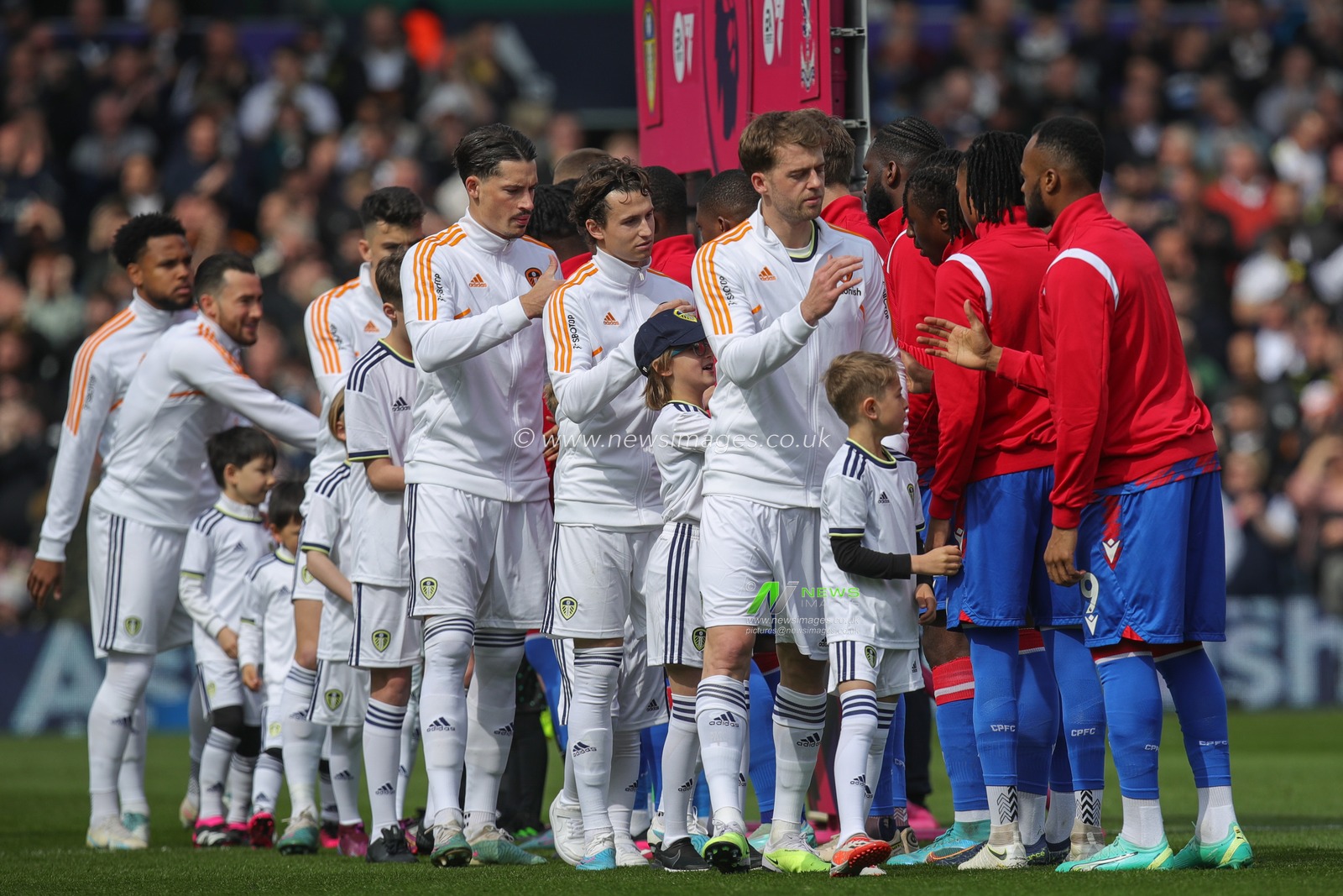 Both sets of players shake hands ahead of the Premier League match Leeds United vs Crystal Palace at Elland Road, Leeds, United Kingdom, 9th April 2023

(Photo by James Heaton/News Images)