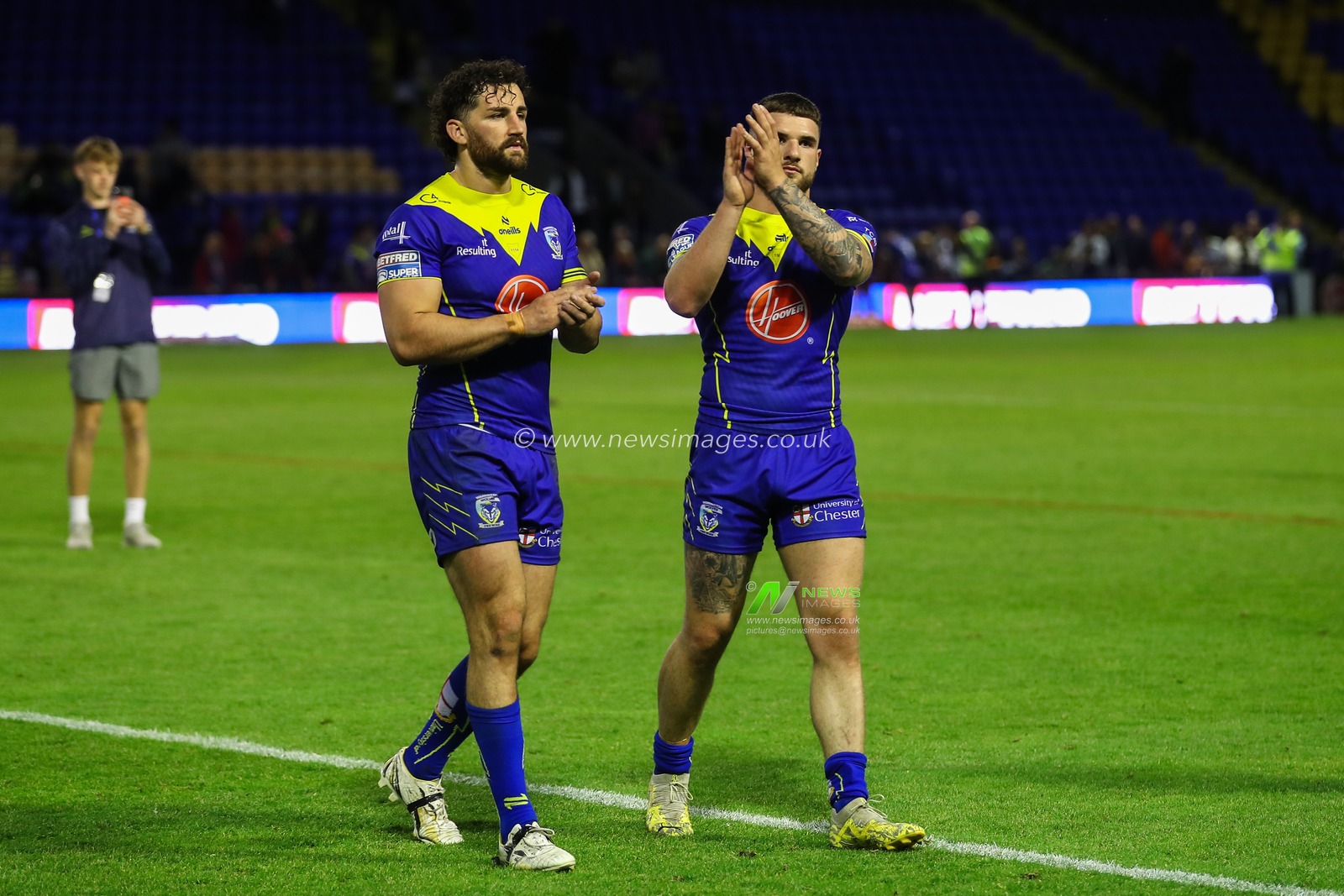 Toby King of Warrington Wolves and Connor Wrench of Warrington Wolves applauds the home fans after the Betfred Super League Round 14 match Warrington Wolves vs Salford Red Devils at Halliwell Jones Stadium, Warrington, United Kingdom, 14th June 2024

(Photo by Gareth Evans/News Images)