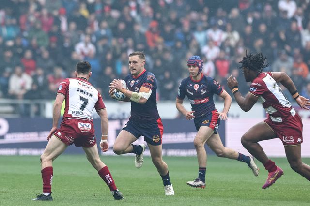 Matty Lees of St. Helens breaks with the ball during the Betfred Super League Round 8 match Wigan Warriors vs St Helens at The Brick Community Stadium, Wigan, United Kingdom, 18th April 2025

(Photo by Mark Cosgrove/News Images)