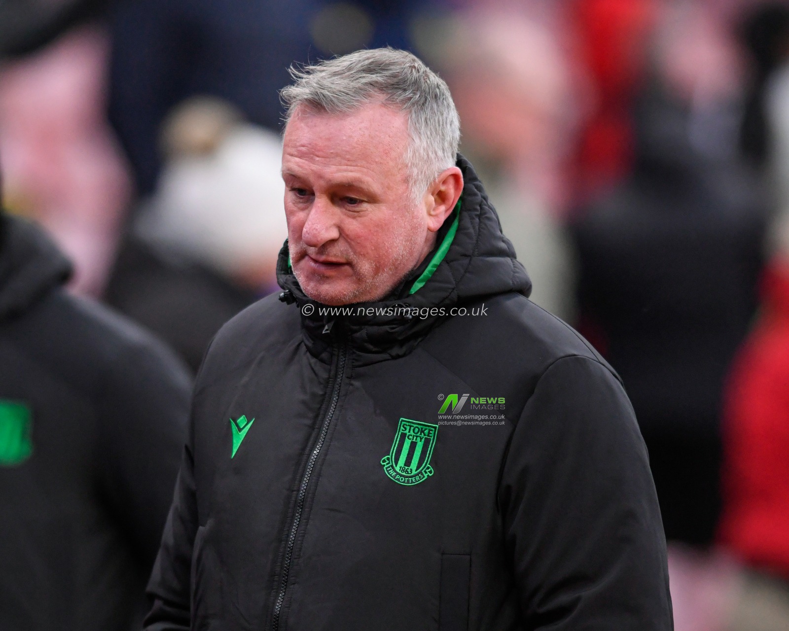 Michael O'Neill manager of Stoke City leaves the technical area at half time