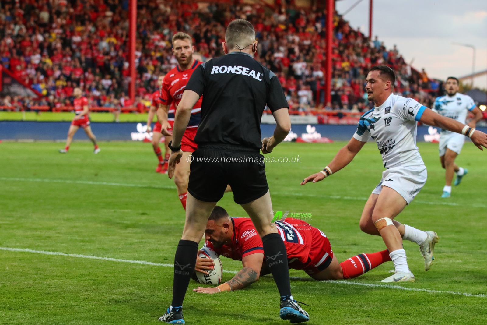 Elliot Minchella #17 of Hull KR goes over for a try in the first which is disallowed for a forward pass