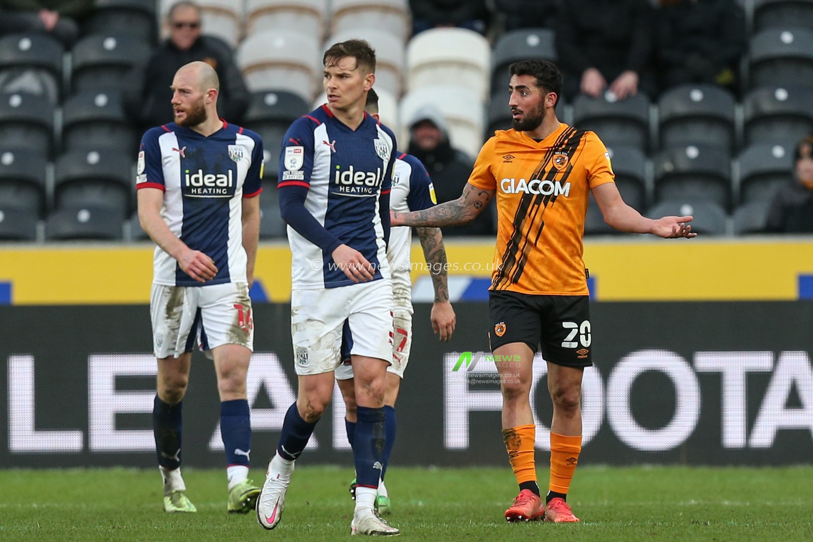Allahyar Sayyadmanesh #20 of Hull City gestures team mates