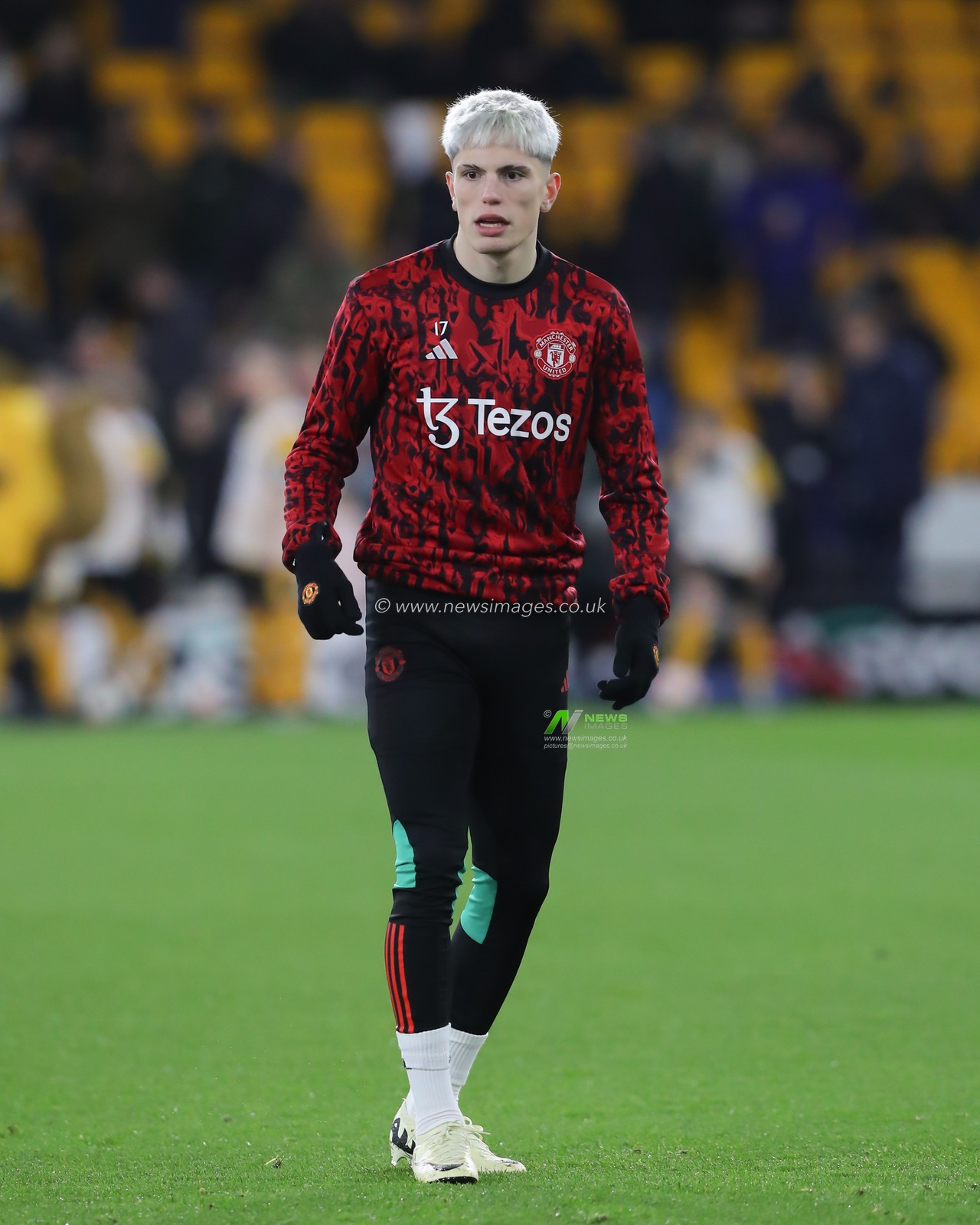 Alejandro Garnacho of Manchester United warms up ahead of the match, during the Premier League match Wolverhampton Wanderers vs Manchester United at Molineux, Wolverhampton, United Kingdom, 1st February 2024

(Photo by Gareth Evans/News Images)