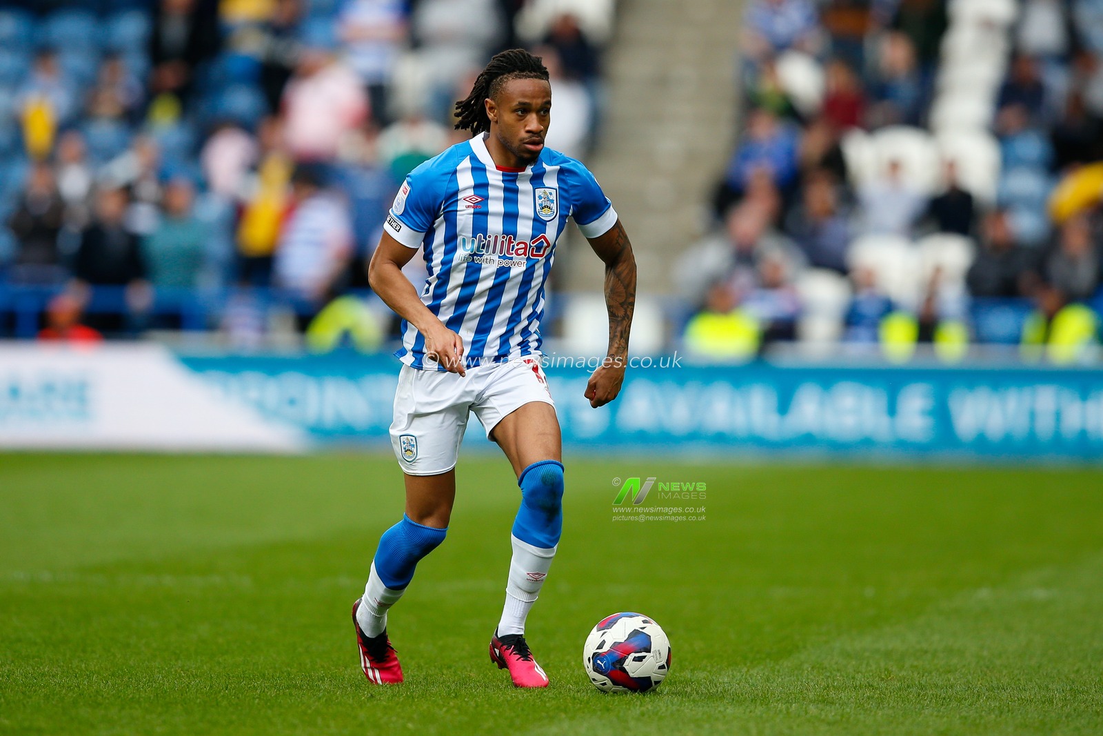 David Kasumu #18 of Huddersfield Town during the Sky Bet Championship match Huddersfield Town vs Reading at John Smith's Stadium, Huddersfield, United Kingdom, 8th May 2023

(Photo by Ben Early/News Images)