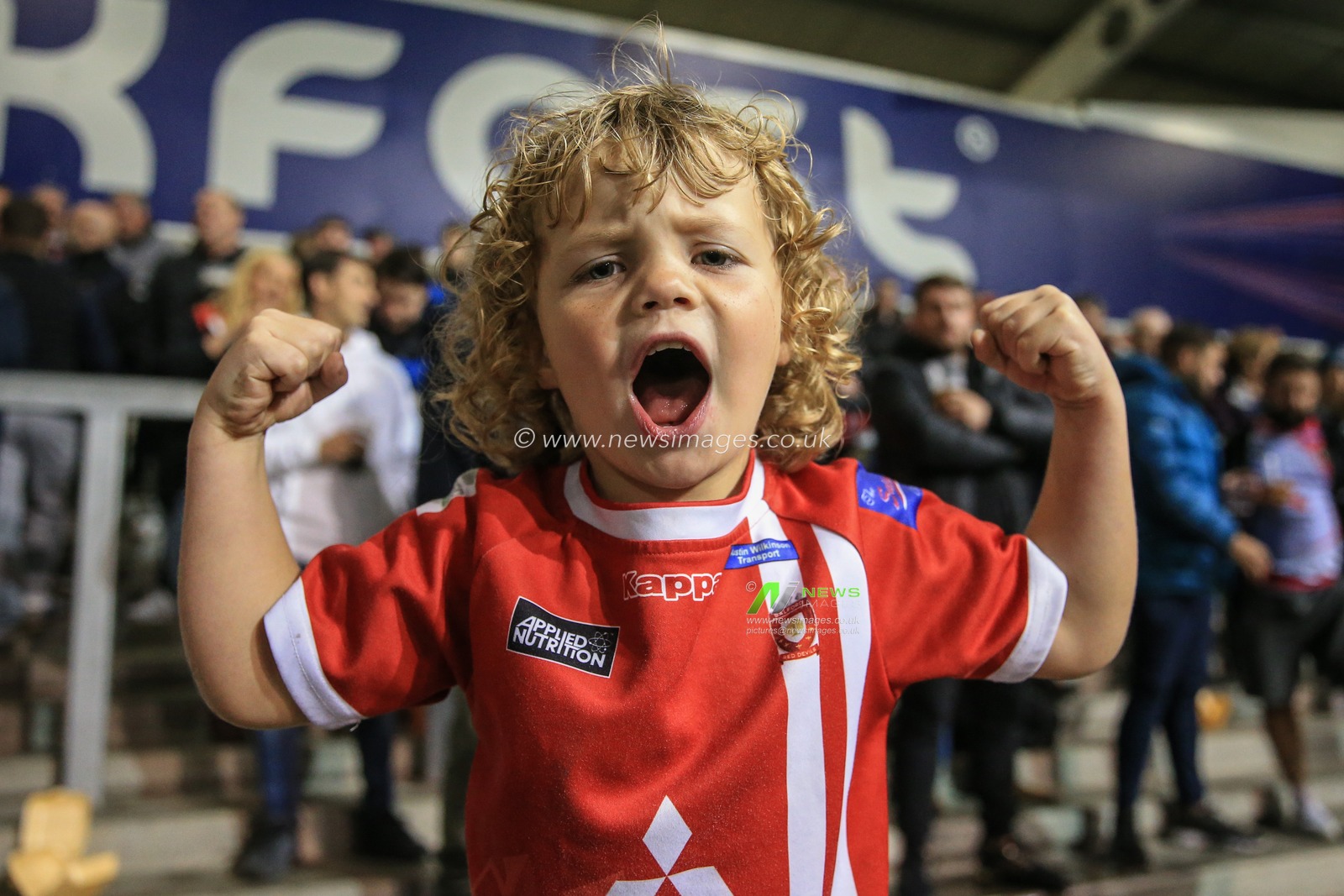 26th September 2019 ,  AJ Bell Stadium, Salford, England;  Betfred Super League Rugby, Round Eliminator 2, Salford Red Devils vs Castleford Tigers ; A young Salford fan sings his heart out as Salford prepare for their largest night in their Super League history 

Credit: Mark Cosgrove/News Images