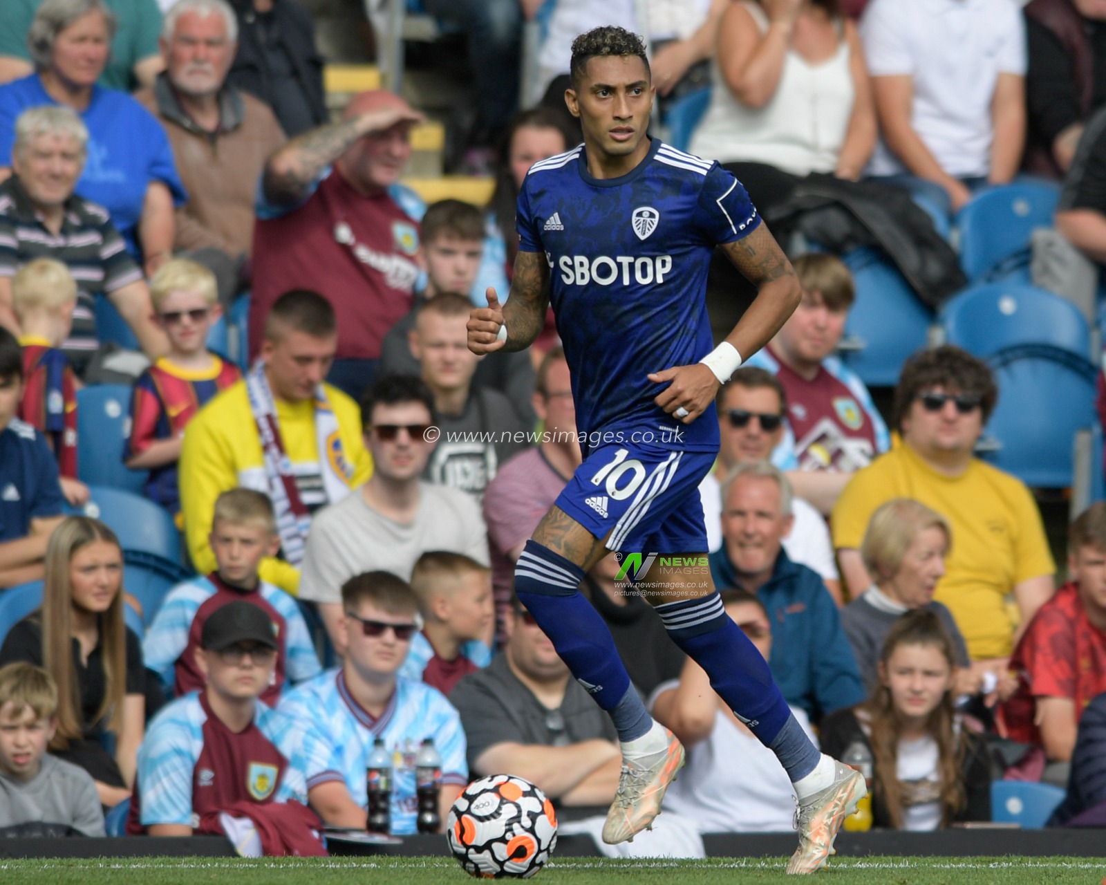 Raphinha #10 of Leeds United runs with the ball