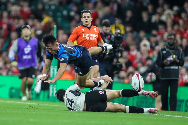 Louis Rees-Zammit of Wales takes out Tomoki Osada of Japan during the Quilter Nations Series 2025 match Wales vs Japan at Principality Stadium, Cardiff, United Kingdom, 15th November 2025

(Photo by Andrew Lewis/News Images)

*** GER AUT SUI OUT ***