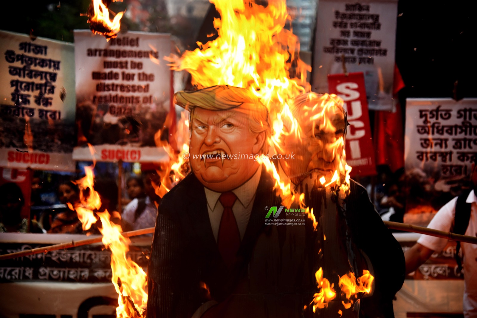 Activists from the Socialist Unity Centre of India (SUCI) burned an effigy of U.S. President Donald Trump and Israeli Prime Minister Benjamin Netanyahu during an anti-Israel protest to express solidarity with Palestinians, in Kolkata on October 7, 2025.Photo by Debajyoti Chakraborty.(Photo: Debajyoti Chakraborty/News Images)