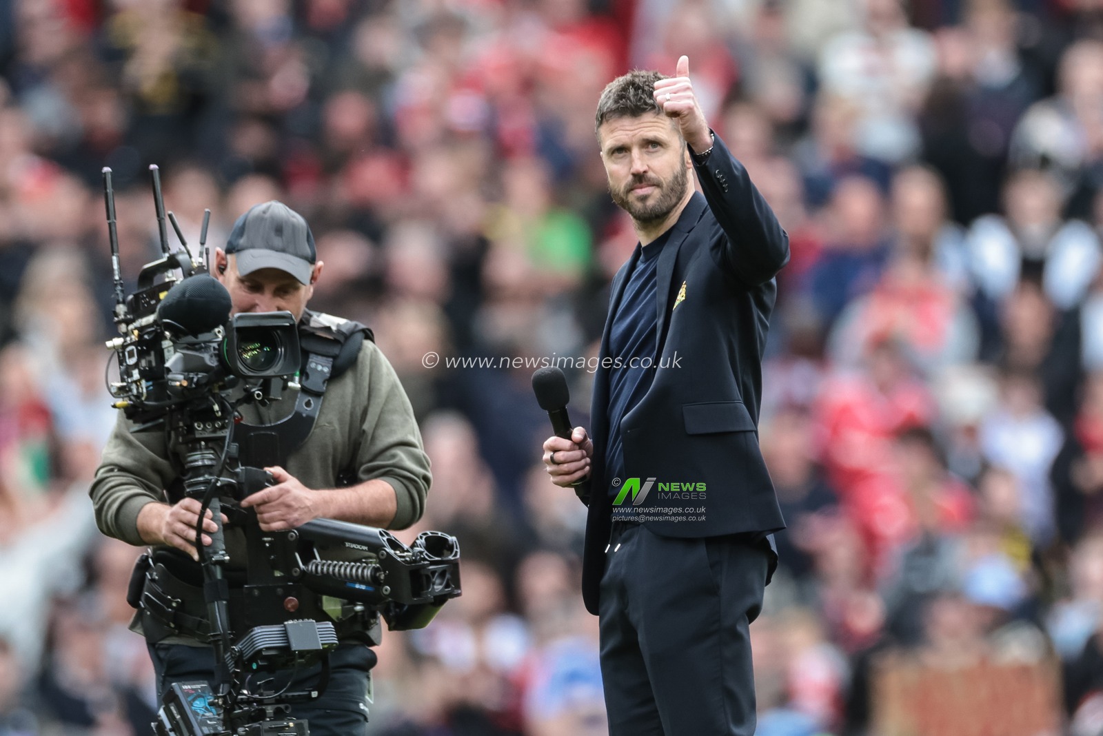 Michael Carrick manager of Manchester United addresses Old Trafford after the final home game of the season during the Premier League match Manchester United vs Nottingham Forest at Old Trafford, Manchester, United Kingdom on 17 May 2026

(Photo by Mark Cosgrove/News Images)