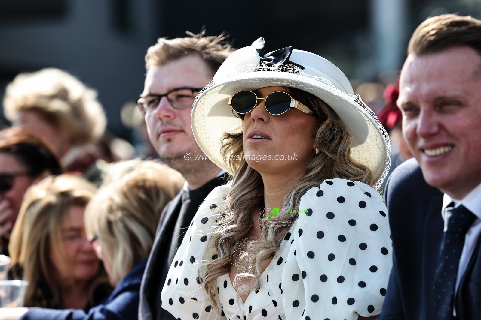 Racegoers watch on during the Randox Grand National 2025 Day 1 Opening Day at Aintree Racecourse, Liverpool, United Kingdom, 3rd April 2025

(Photo by Mark Cosgrove/News Images)