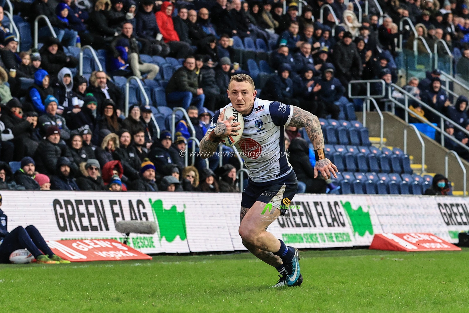Josh Charnley #2 of Warrington Wolves goes over for a try