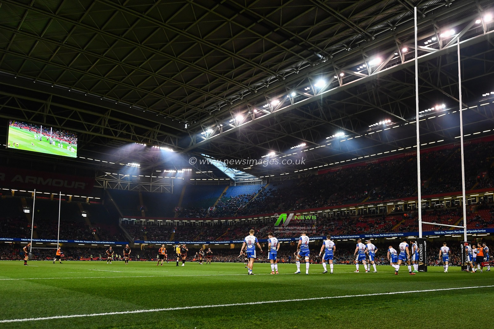 27th April 2019 , Principality Stadium , Cardiff, Wales ; Guinness pro 14â€™s, Round 21, Dragons vs Scarlets ; Scarlets players watch Josh Lewis of Dragons kick at goal

Credit:  Craig Thomas/News Images