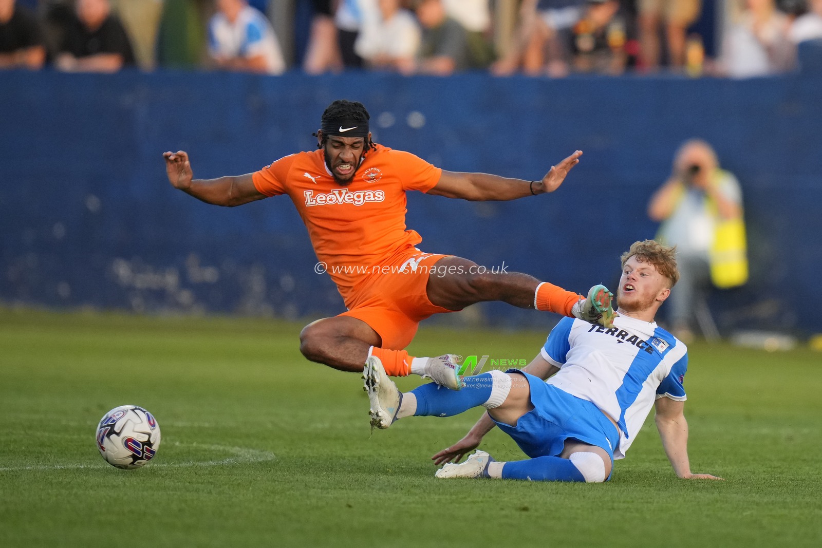 Luca Stephenson #18 of Barrow competes for the ball with Dominic Thompson #23 of Blackpool during the EFL Trophy match Barrow vs Blackpool at SO Legal Stadium, Barrow-in-Furness, United Kingdom, 5th September 2023

(Photo by Steve Flynn/News Images)