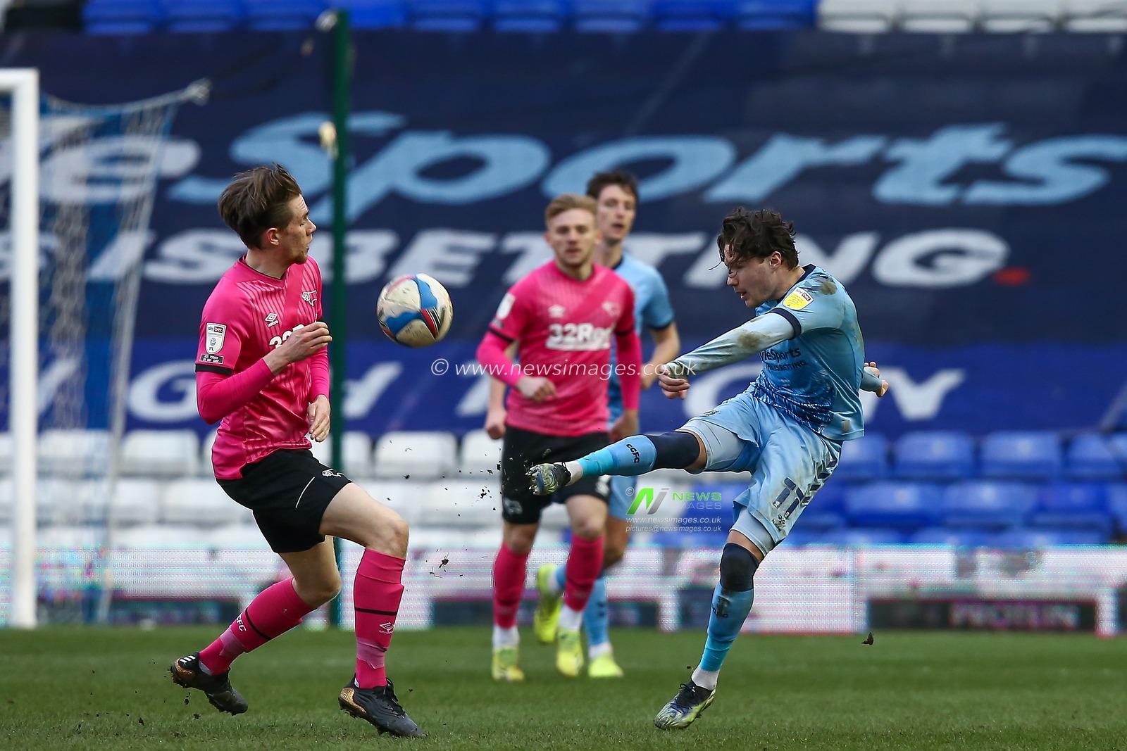 Callum OHare #11 of Coventry City volleys the ball clear