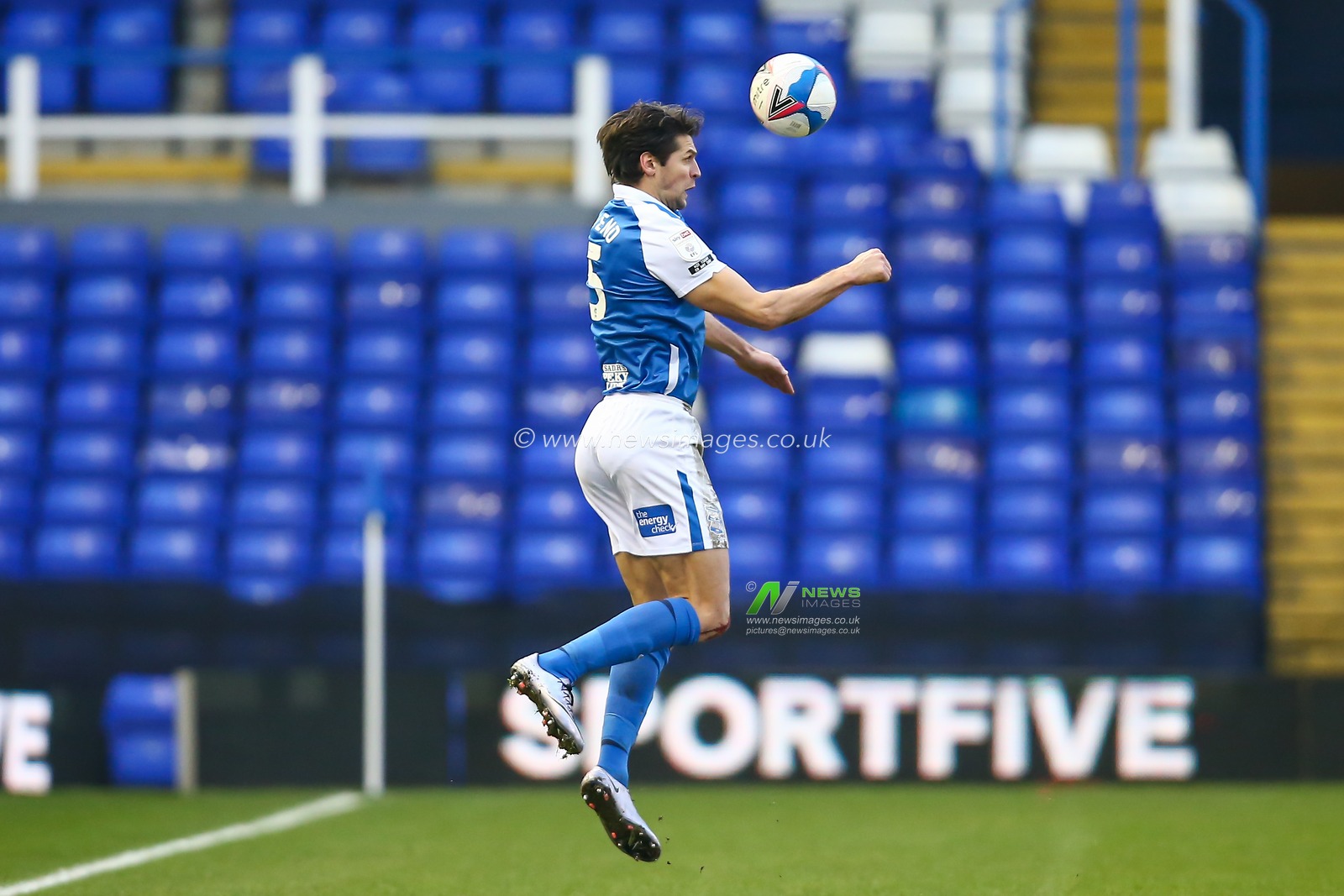 George Friend #5 of Birmingham City controls the ball mid air