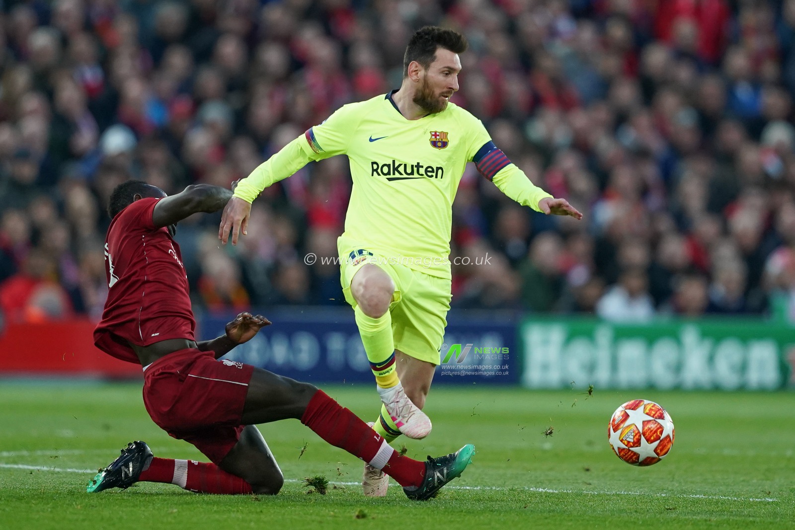 Barcelona's Lionel Messi is tackled by  Liverpool's Sadio Mane

7th Mayl 2019 , Anfield Stadium, Liverpool, England;  UEFA Champions League Semi Final, Second Leg, Liverpool FC vs FC Barcelona 

Credit: Terry Donnelly/News Images