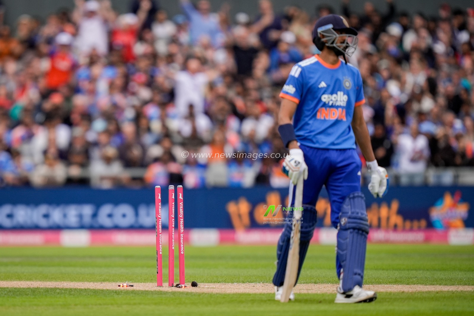 Axar Patel of India has his stumps broken and is run out by Jos Buttler of England during the Second Vitality T20 International match England vs India at Old Trafford, Manchester, United Kingdom on 04 July 2026

(Photo by Maynard Manyowa/News Images)