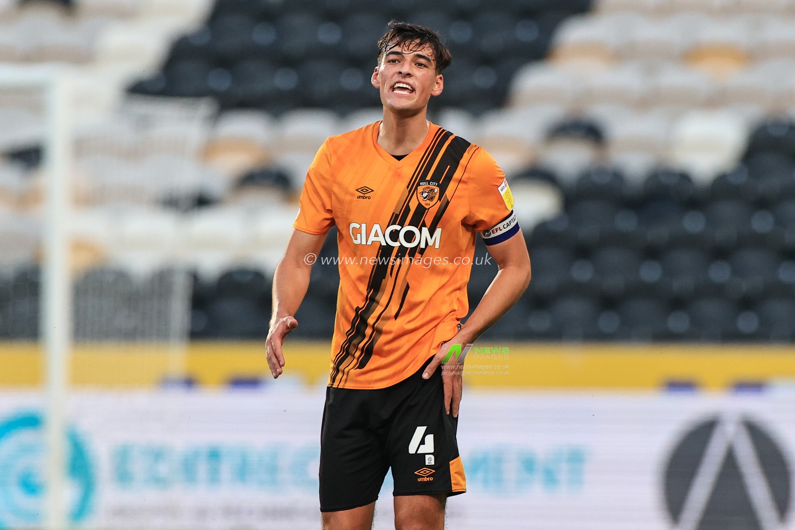 Jacob Greaves #4 of Hull City gives his team instructions