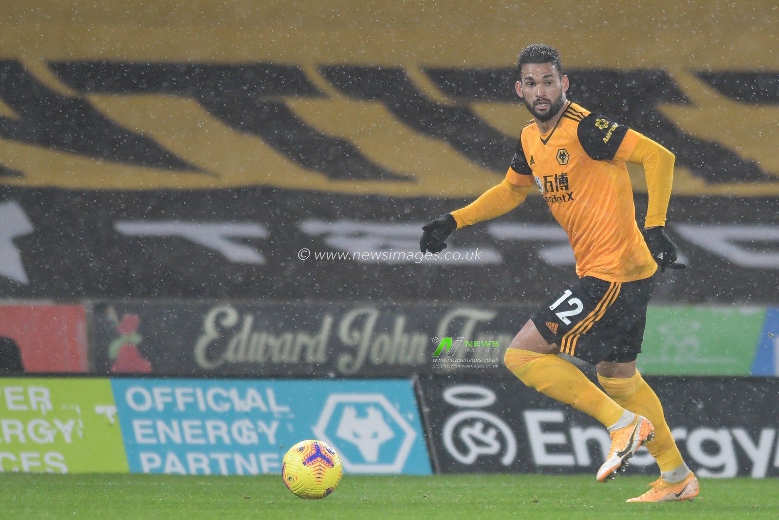 Willian Jose #12 of Wolverhampton Wanderers looks for a passing option