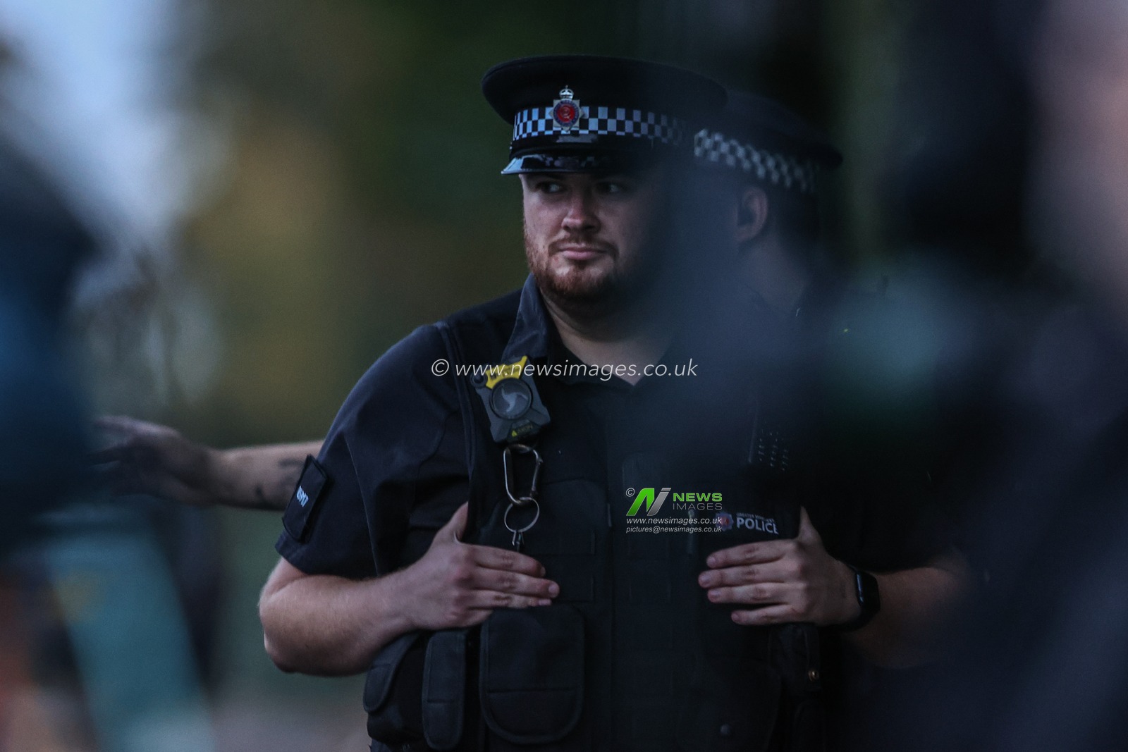 Police wait on standby as the sun has set and it begins to get dark during the Manchester synagogue attack at Manchester Synagogue, Manchester, United Kingdom, 2nd October 2025

(Photo by Alfie Cosgrove/News Images)