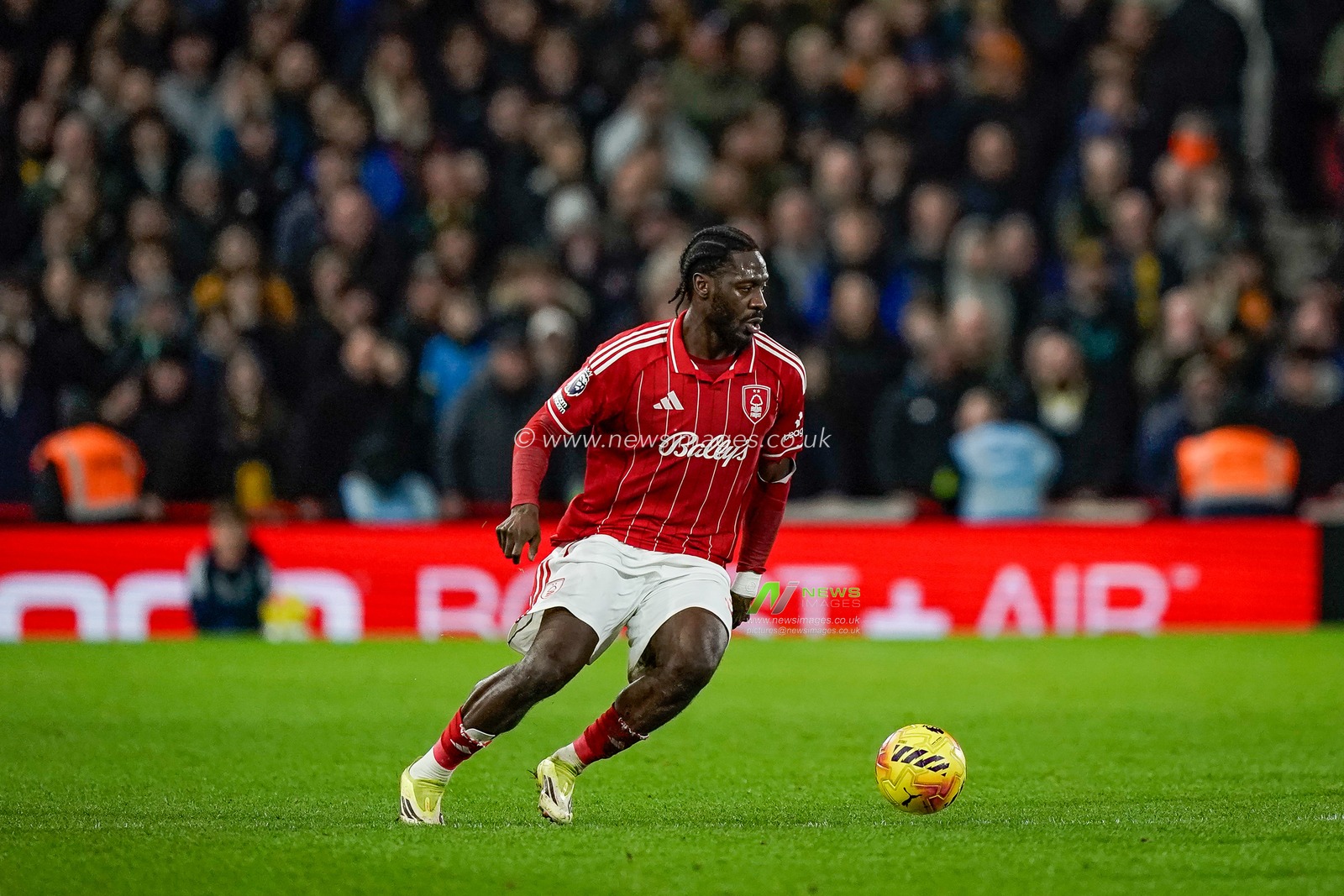 Ola Aina of Nottingham Forest controls the ball  during the Premier League match Nottingham Forest vs Wolverhampton Wanderers at City Ground, Nottingham, United Kingdom on 11 February 2026

(Photo by Maynard Manyowa/News Images)