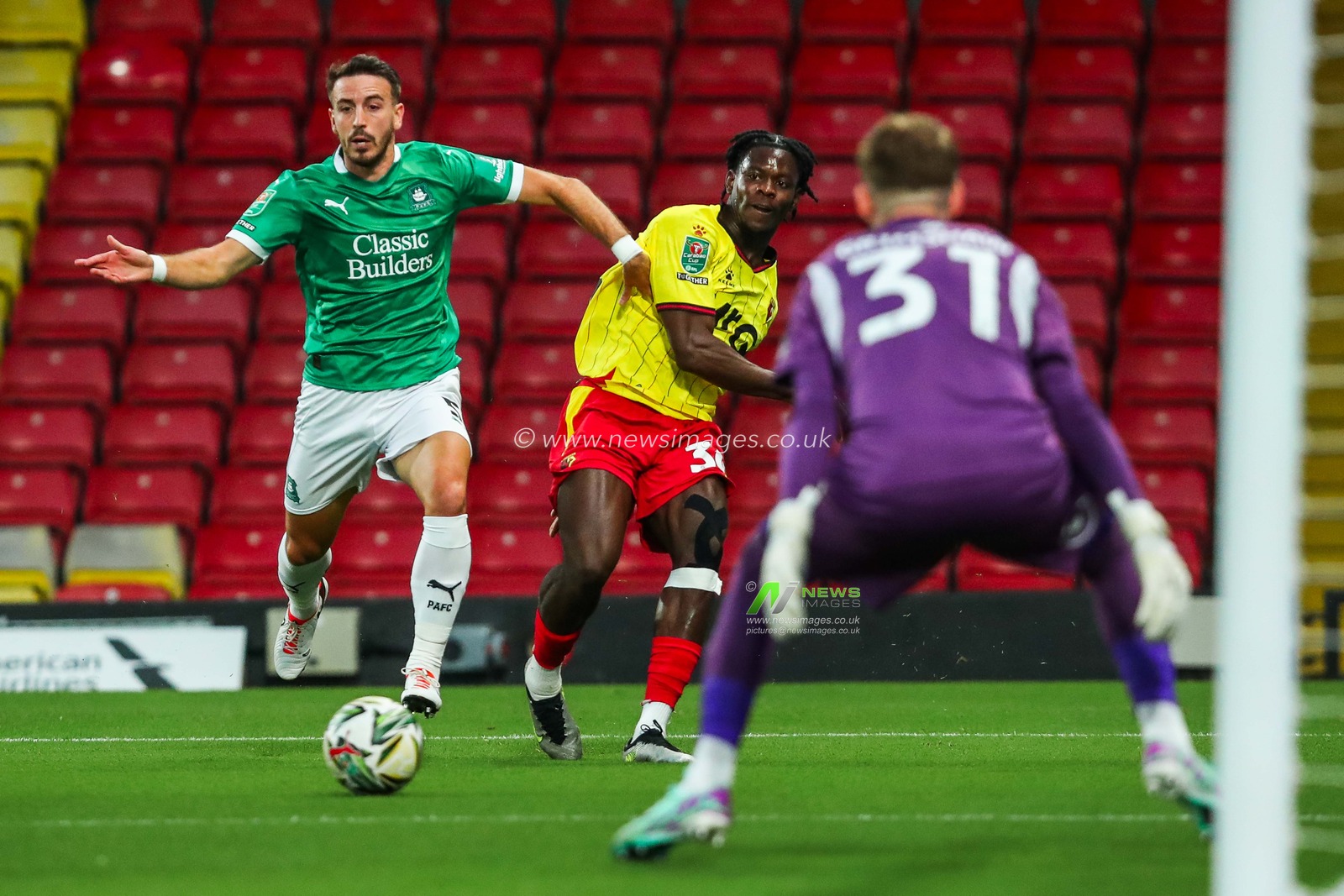Kwadwo Baah of Watford is put under pressure by Julio Pleguezuelo of Plymouth Argyle during the Carabao Cup match Watford vs Plymouth Argyle at Vicarage Road, Watford, United Kingdom, 27th August 2024

(Photo by Izzy Poles/News Images)