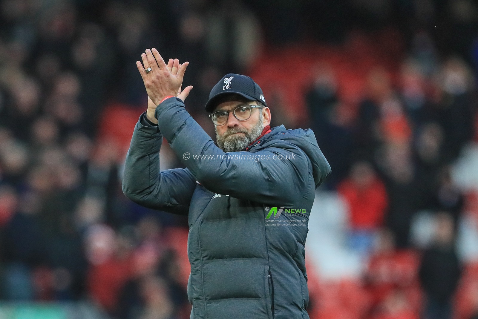 14th December 2019, Anfield, Liverpool, England; Premier League, Liverpool v Watford :  Jurgen Klopp manager of Liverpool applauds the fans in the Cop as Liverpool win Watford 2-0 


Credit: Mark Cosgrove/News Images