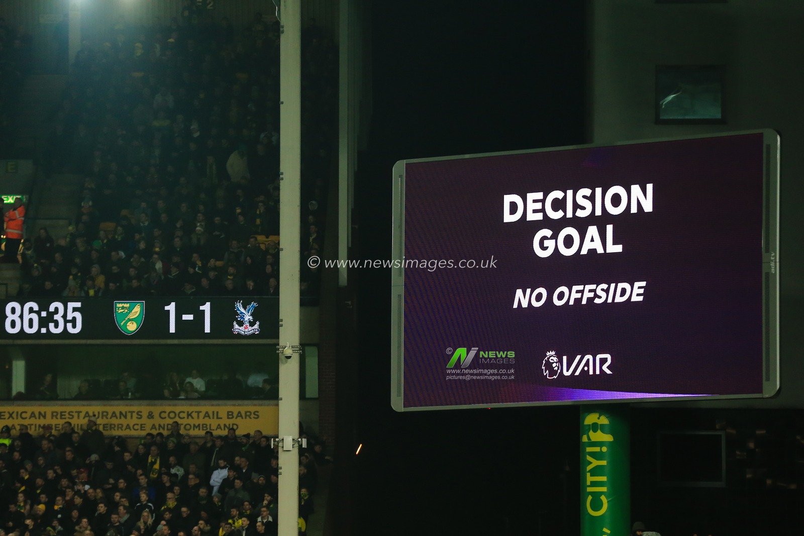 1st January 2020, Carrow Road, Norwich, England; Premier League, Norwich City v Crystal Palace : Crystal Palace are awarded a goal after a VAR review to make it 1-1.

Credit: Georgie Kerr/News Images