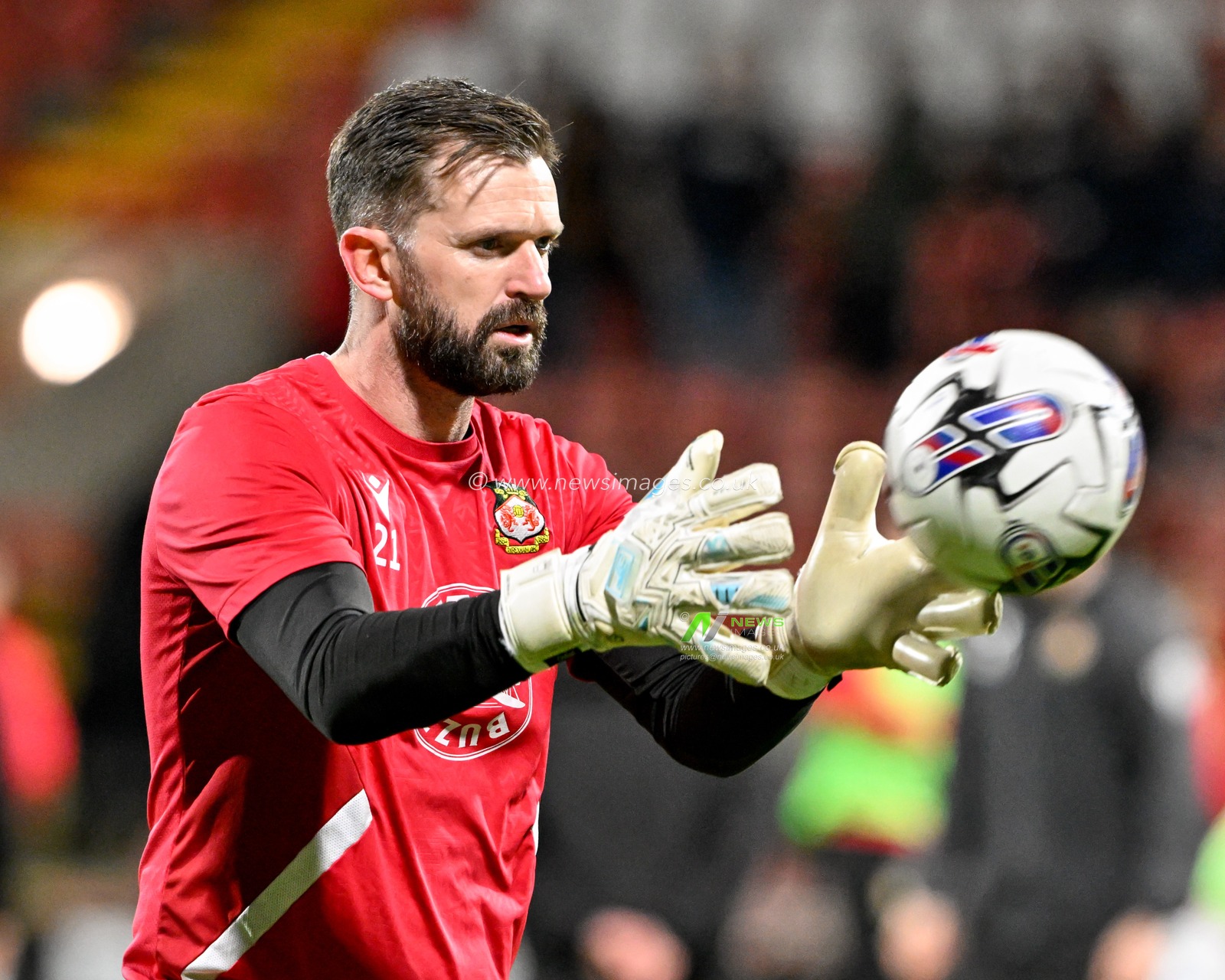 Mark Howard of Wrexham warms up ahead of the match, during the Sky Bet League 2 match Wrexham vs Harrogate Town at SToK Cae Ras, Wrexham, United Kingdom, 12th March 2024

(Photo by Cody Froggatt/News Images)