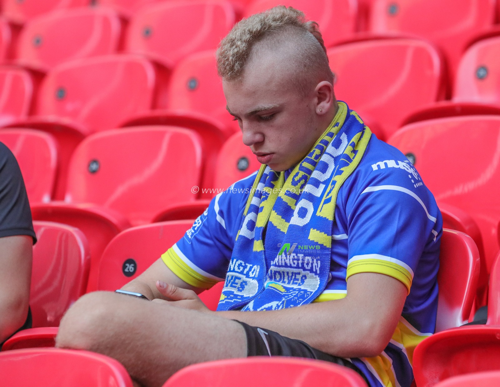 24th August 2019 , Wembley Stadium, London England ; 2019 Coral Challenge Cup Final ; St Helens vs Warrington Wolves ; Warrington fans bask in the sun before kick-off



Credit: Mark Cosgrove/News Images