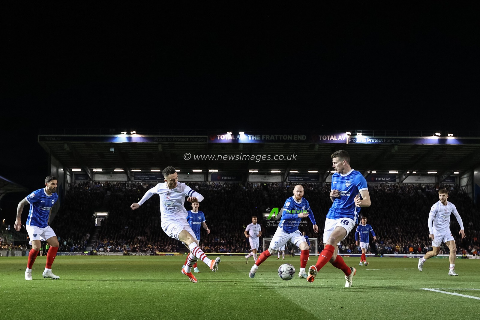 Jordan Williams of Barnsley shoots on goal, blocked by Conor Shaughnessy #18 of Portsmouth during the Sky Bet League 1 match Portsmouth vs Barnsley at Fratton Park, Portsmouth, United Kingdom, 16th April 2024

(Photo by Mark Cosgrove/News Images)